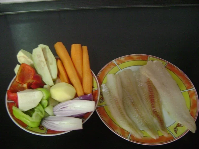 Fish fillet with vegetables in butter