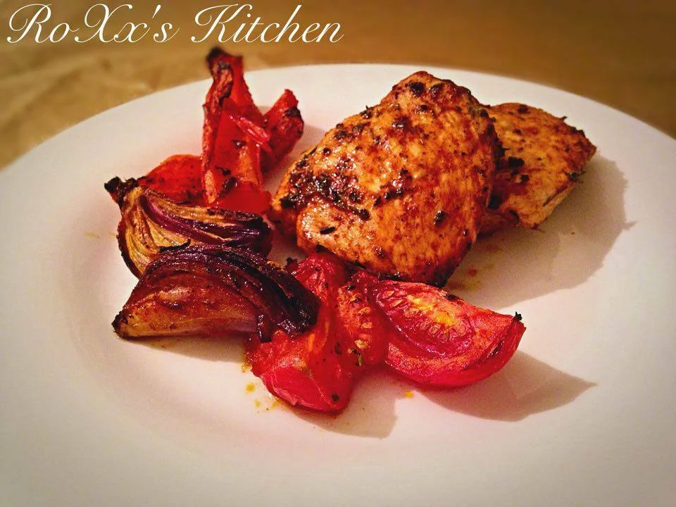 Oven-baked chicken breast with vegetables