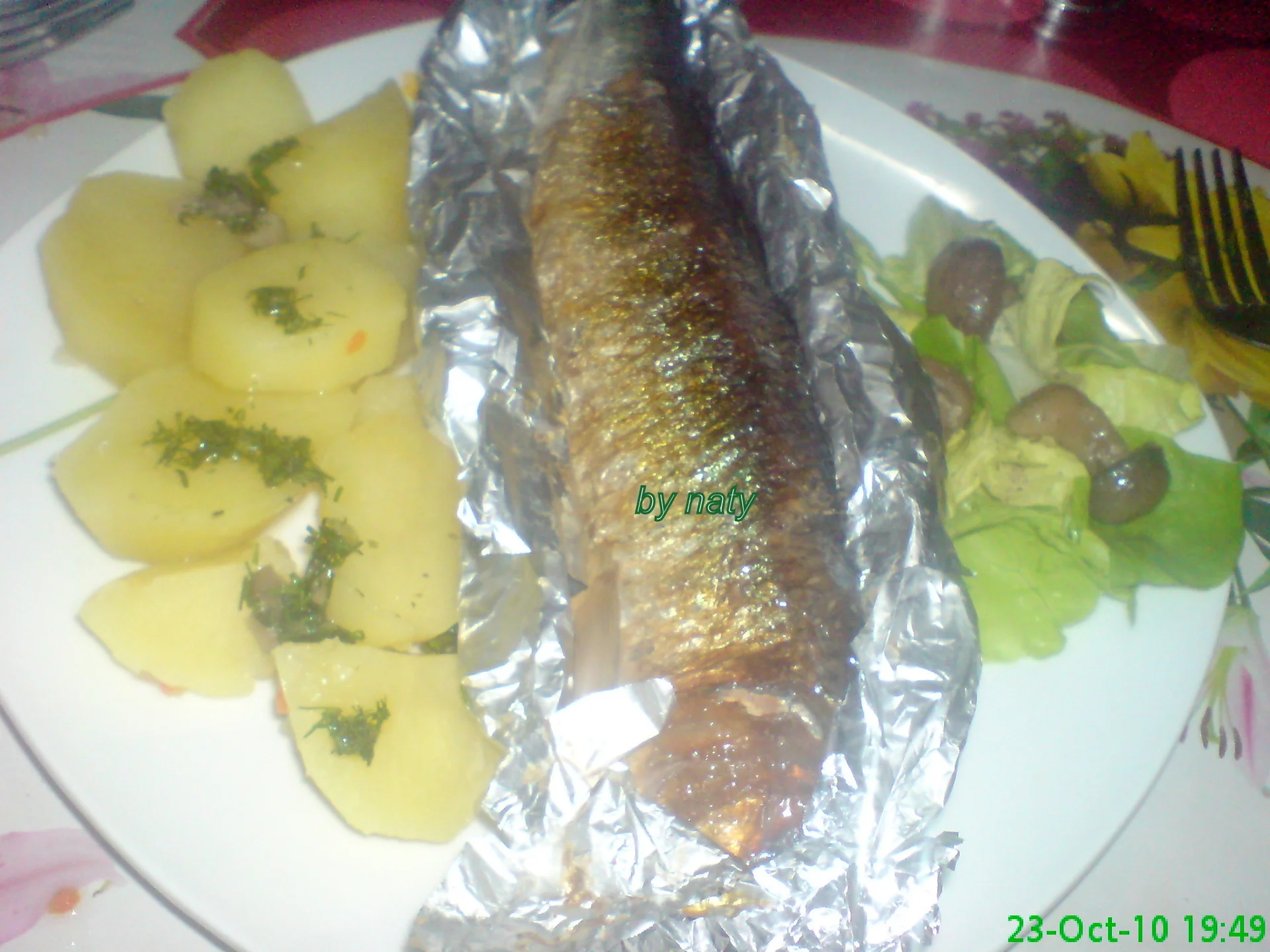 Grilled mullet with potatoes and green sauce