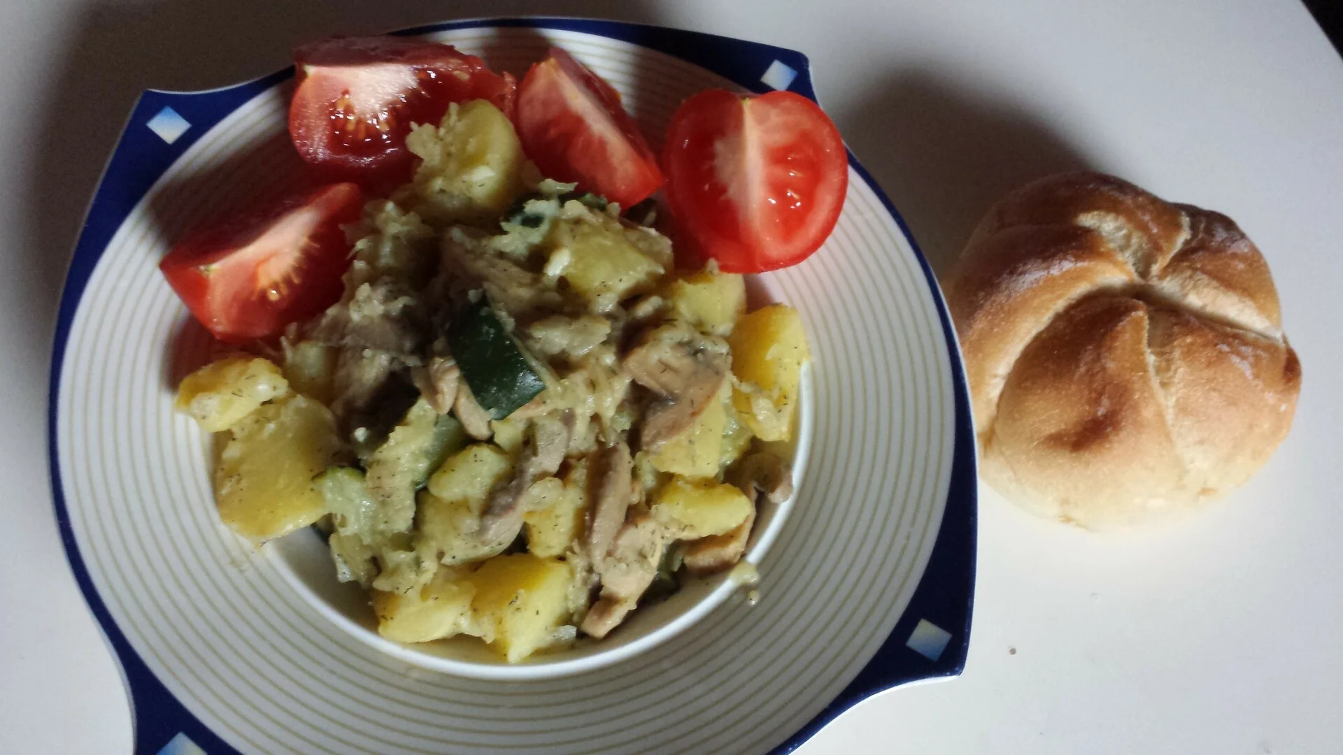 Potato stew with zucchini and mushrooms