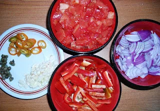 Penne with tuna, al dente vegetables, and capers