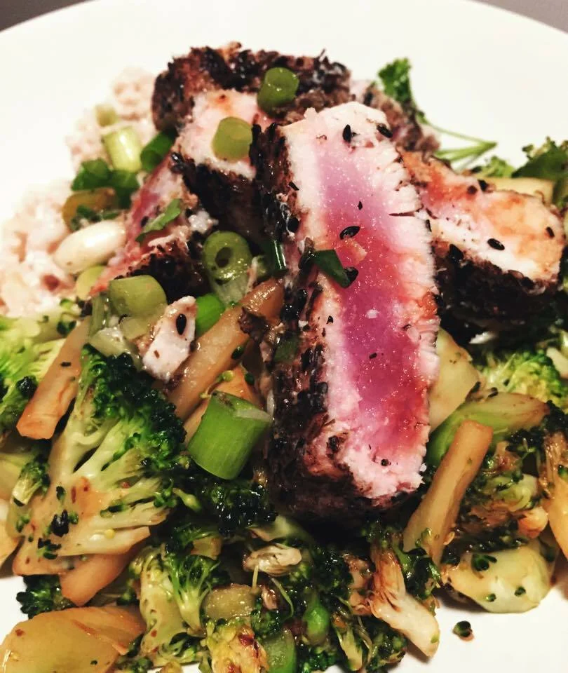 Tuna in a green tea crust with coconut milk rice and broccoli in Hoisin sauce