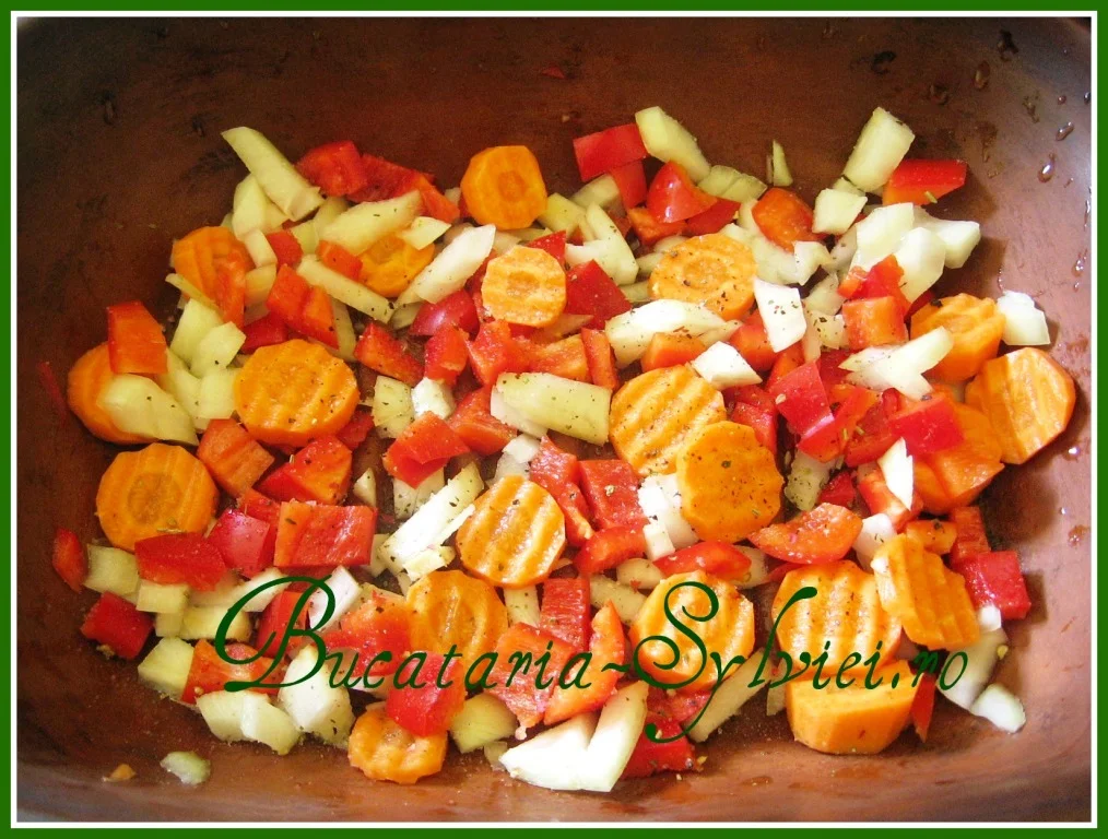 Chicken thighs in a Roman pot on a bed of vegetables