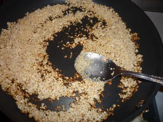 Yufka pastry pie with salty cheese and roasted nuts