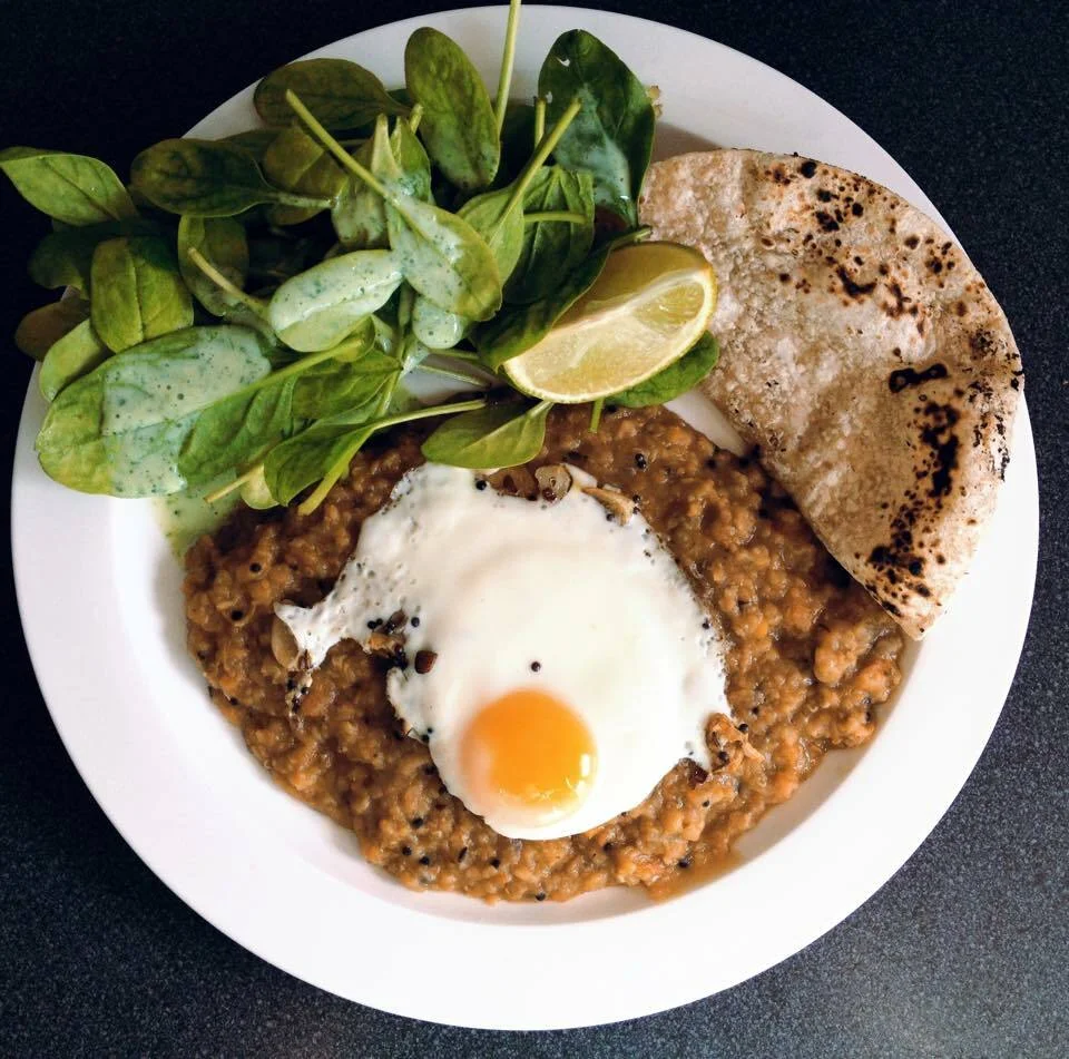 Lentils with pumpkin and fried eggs with curry