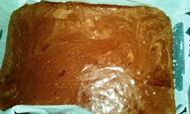 Nut cake with vanilla cream and chocolate